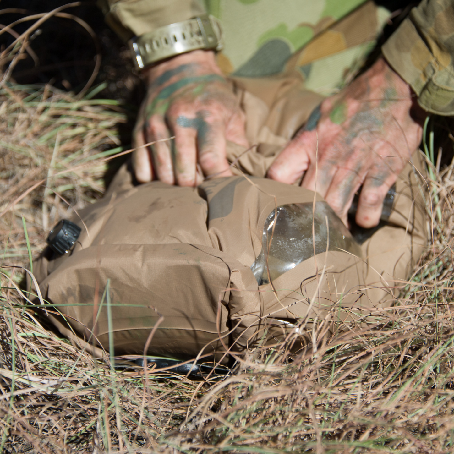 Man rubbing clothes washing with Tactical wash bag